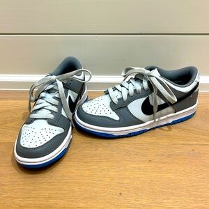 Nike. Kids. Gray, Black, White and Blue. Size 3.5. Gently Used. Good condition.